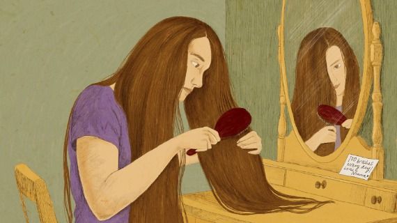 A young woman sits in front of the mirror brushing her long straight hair. A note in front of her reads '100 brushes every day. Love, Nonna!'